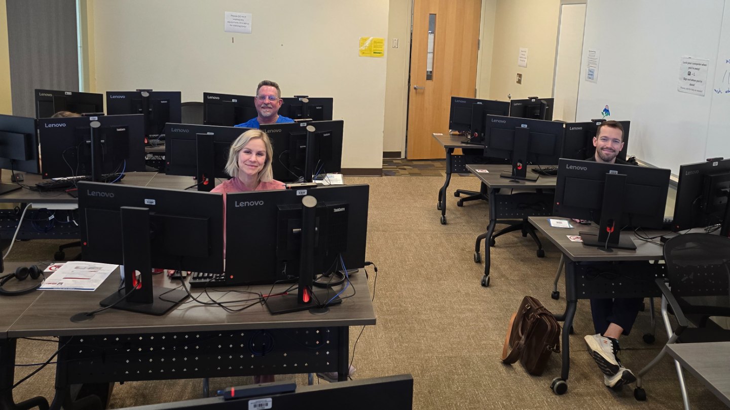 Three ENT providers at their workstations during an Epic training class