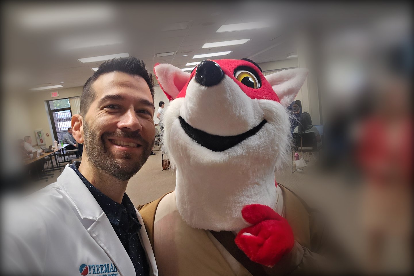 A Freeman physician with Freddy the Fox at the 90 Day GLRA