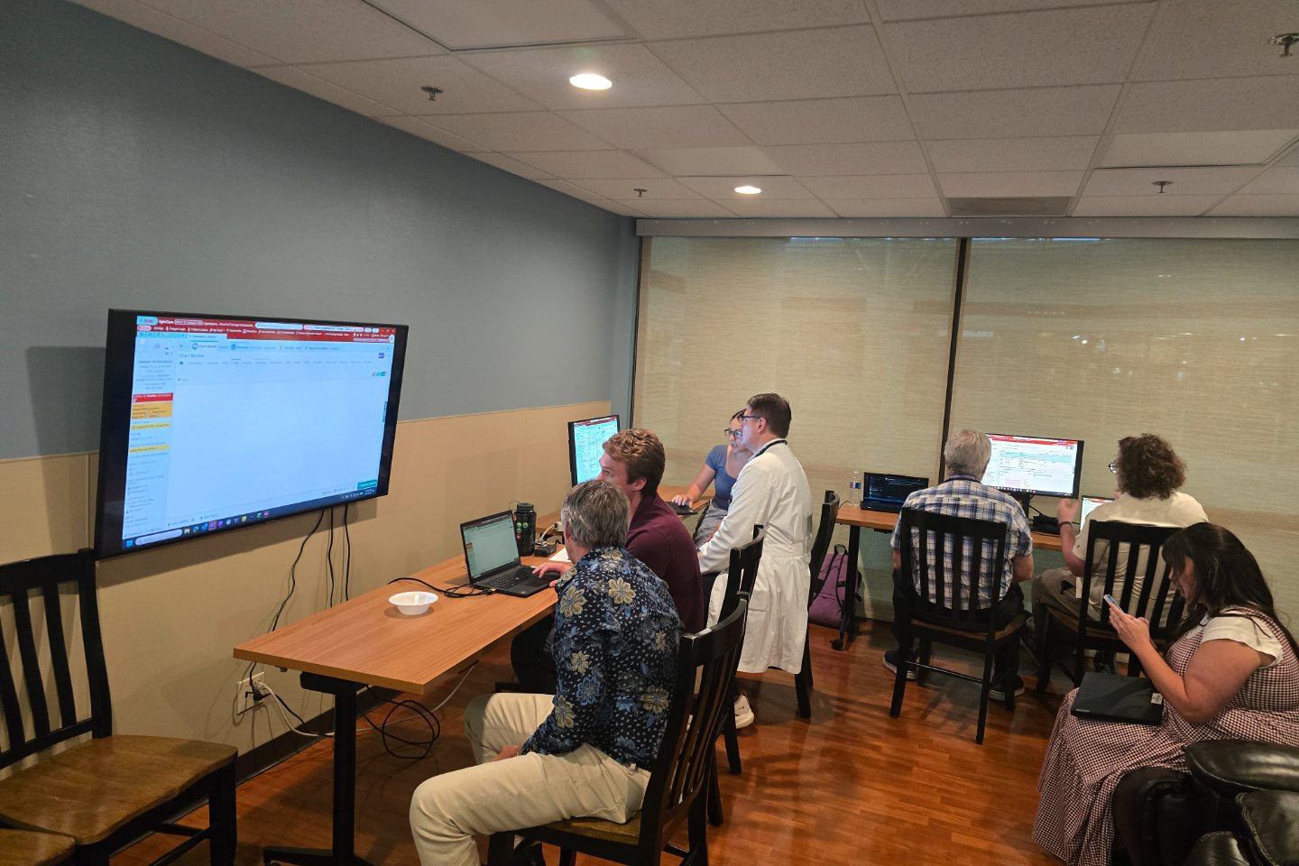 Three Freeman physicians working in Epic at an August Lunch and Learn